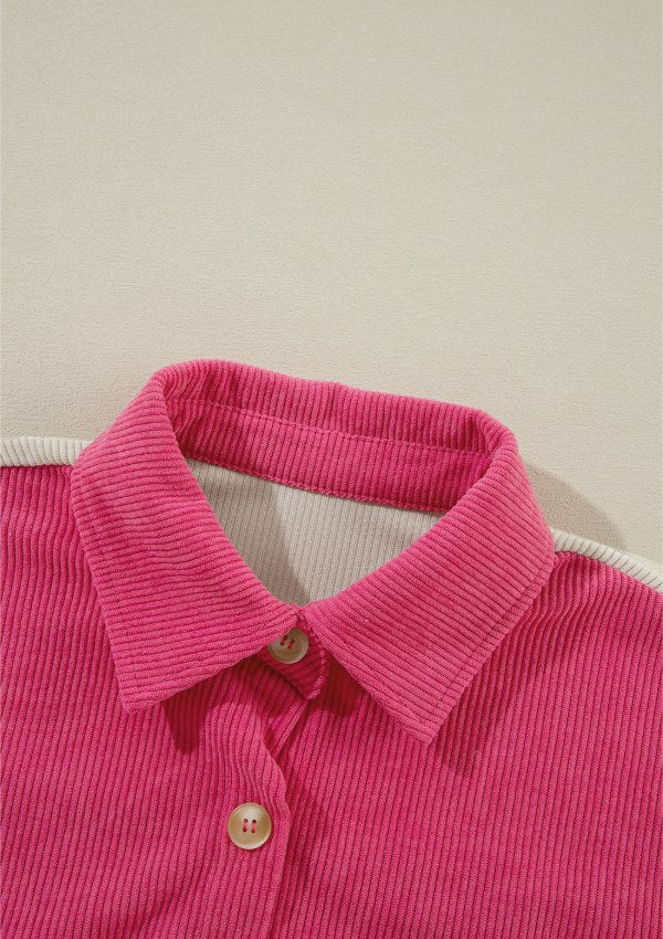 Hot Pink corduroy shacket with button front and collar detail.