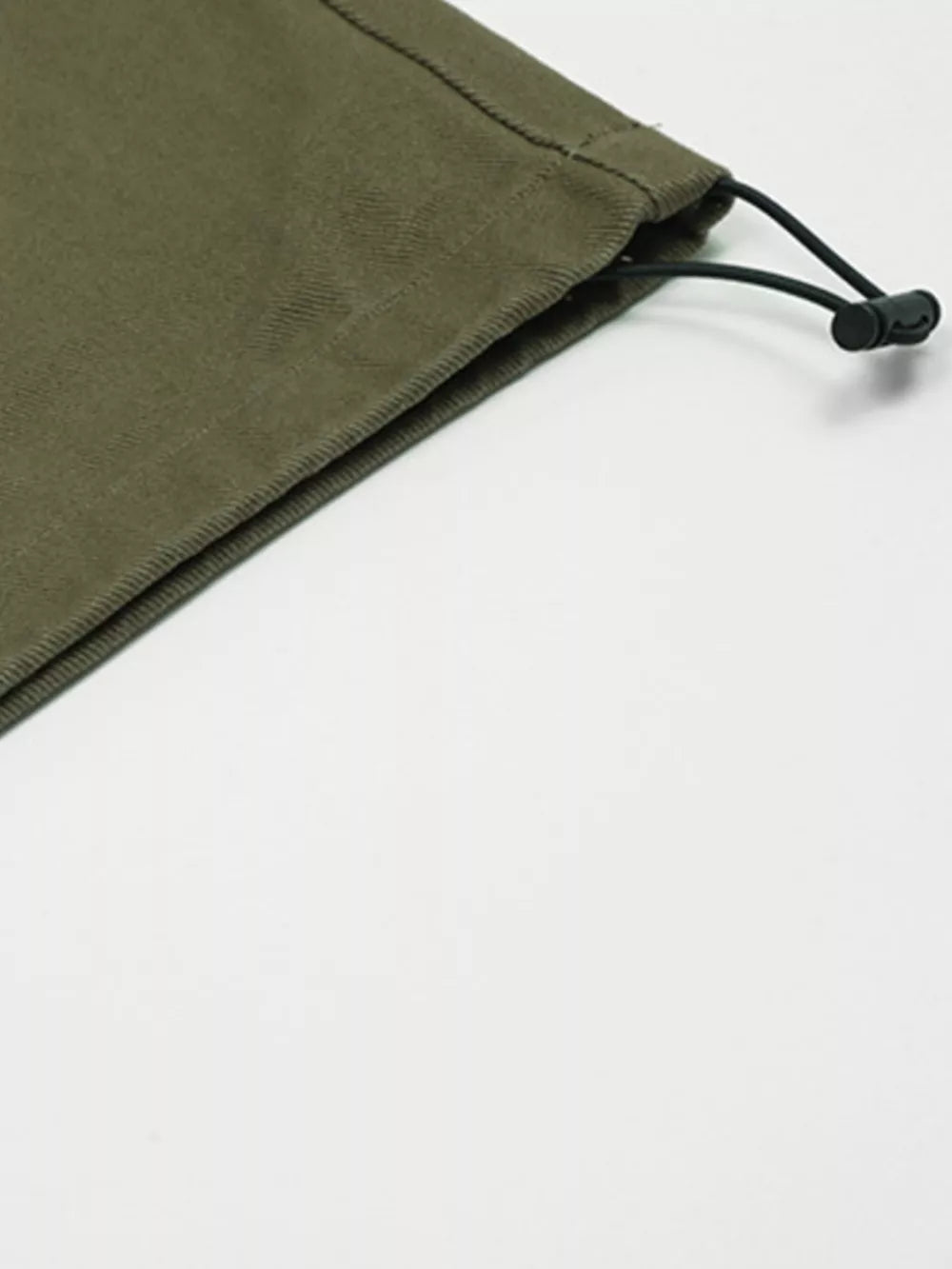 Olive green cargo pants with adjustable drawstring detail