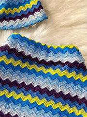 Chevron knit halter crop top and maxi skirt set in blue, yellow, and purple zigzag pattern.