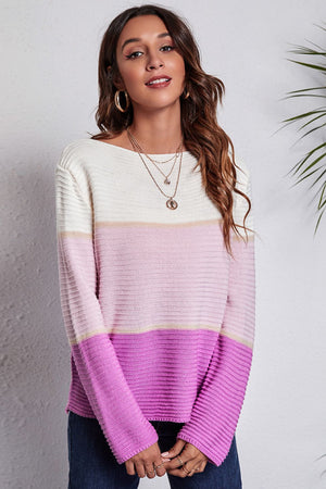 Colorblock ribbed boatneck sweater in pink and white acrylic with horizontal stripes.