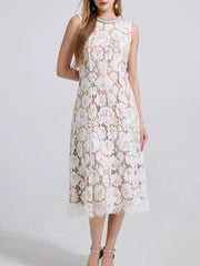 White lace dress with floral pattern and embellished neckline, sleeveless, midi length.