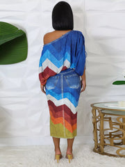 Asymmetrical denim top with chevron print and matching slit midi skirt.