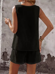 Black cotton two-piece set with sleeveless top and shorts, casual chic outfit