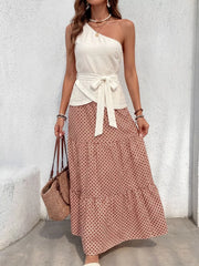 Cream one-shoulder top with tie waist and geometric print maxi skirt set