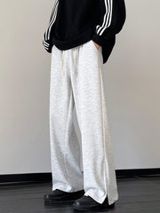 Men's light gray relaxed fit drawstring sweatpants with zippered ankles