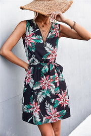 Black floral zip-front mini dress with tie waist and V-neck