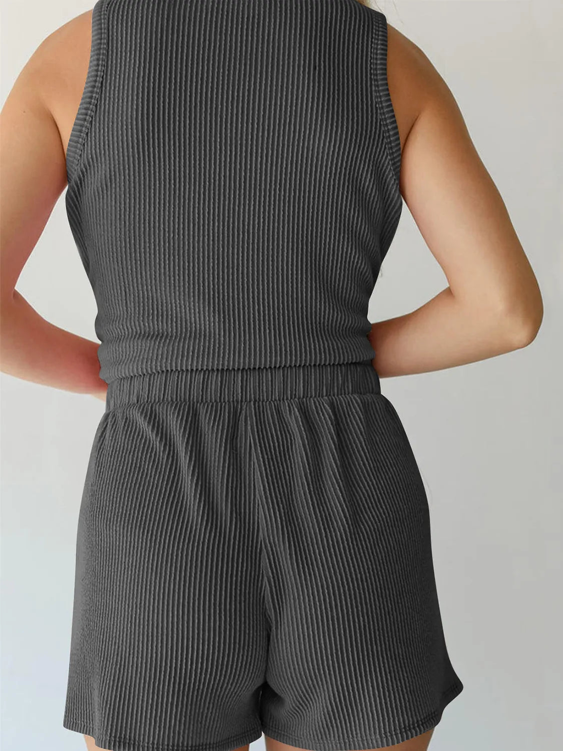 Dark gray ribbed sleeveless coord set with elastic waist shorts.