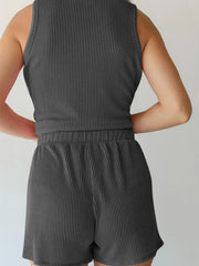 Dark gray ribbed sleeveless coord set with elastic waist shorts.