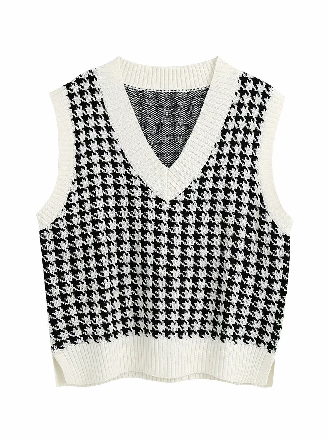 Houndstooth knit v-neck tank top in black and white with white trim.