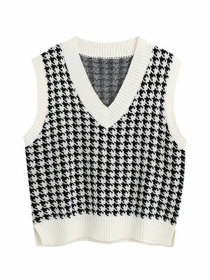 Houndstooth knit v-neck tank top in black and white with white trim.