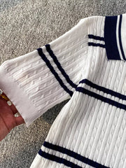 White cable knit polo t-shirt with navy stripes on collar and sleeves