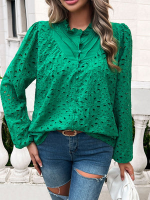 Dark green eyelet embroidered blouse with ruffle collar and button front.