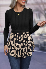 Black ribbed knit peplum blouse with leopard print skirt and long sleeves.