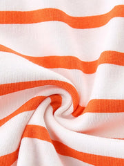 White and orange striped cotton baby polo shirt detail