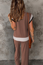 Colorblock sportswear set with contrast trim in hot pink, black, brown, or light blue.