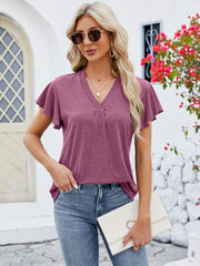 V-neck pleated flutter sleeve top in heathered coral with a relaxed fit.