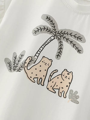White cotton baby tee with playful wildcat and palm tree graphic print.