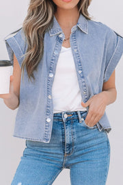 Light blue denim rolled-sleeve shirt jacket with button front and collar.