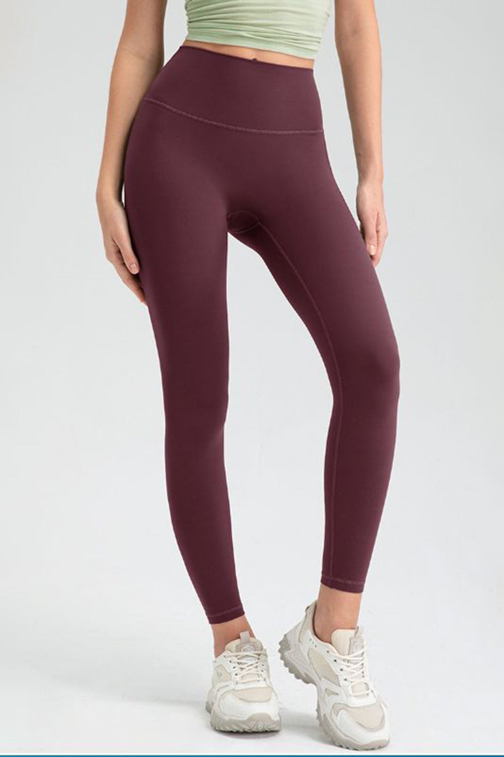 FlexFit high rise leggings in wine, seamless athletic wear with a comfortable fit.
