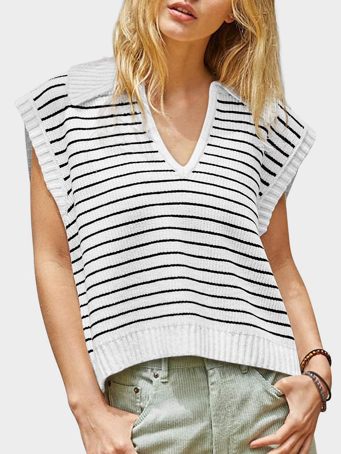 White ribbed knit polo vest with black horizontal stripes and a V-neck.