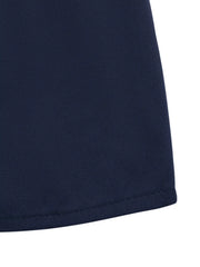 Navy midi dress fabric detail with ruffled hem.