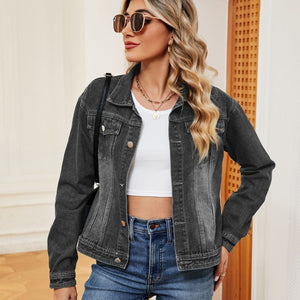 Dark wash denim trucker jacket with button front and chest pockets.