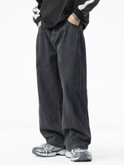 Men's dark wash cotton wide-leg jeans with a casual fit.