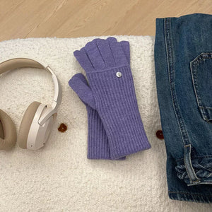 Convertible ribbed knit gloves in purple with a decorative button detail.