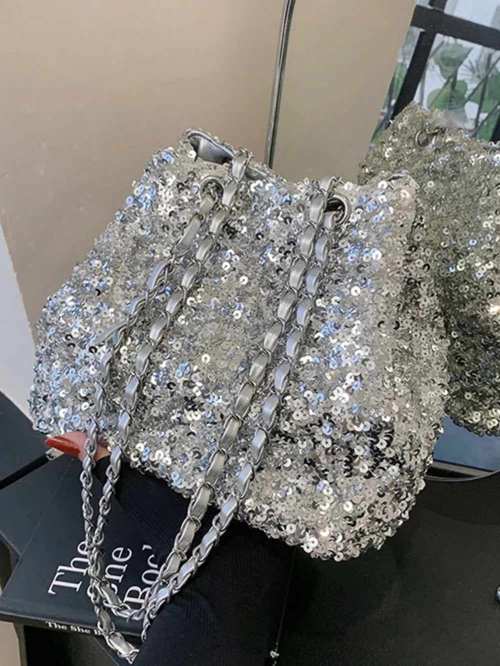Silver sequin bucket bag with double chain strap detail