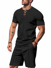 Black lace-up V-neck t-shirt and drawstring shorts set for men.