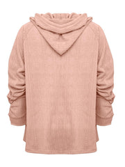 Textured knit raglan hoodie in watermelon pink with ruched sleeves.