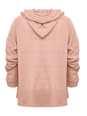 Textured knit raglan hoodie in watermelon pink with ruched sleeves.