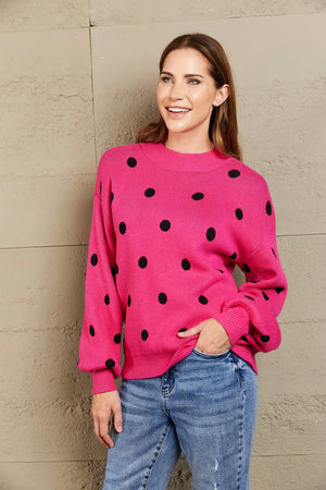 Hot Pink polka dot knit sweater with balloon sleeves and crew neck.