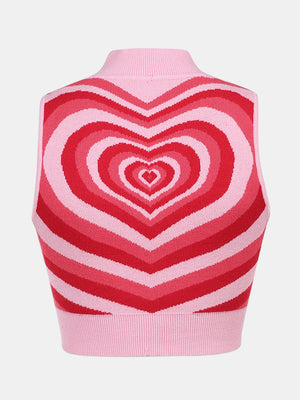 Pink knit tank top with concentric heart intarsia pattern in shades of red and pink.