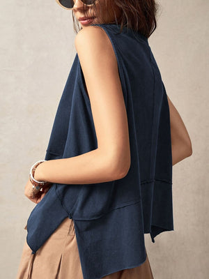 Navy sleeveless tank top with asymmetric hemline and raw edge detail.
