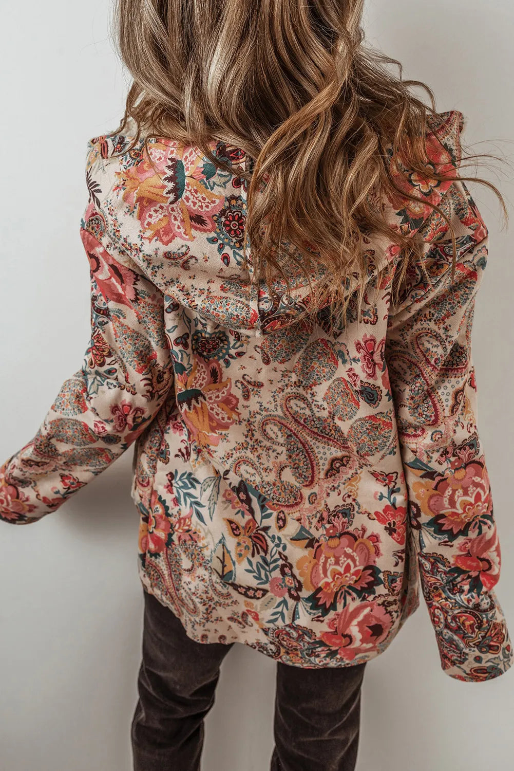 Floral paisley hooded jacket with sherpa lining, shown from the back.