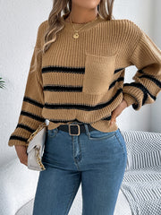 Caramel knit sweater with black stripes and a chest pocket.