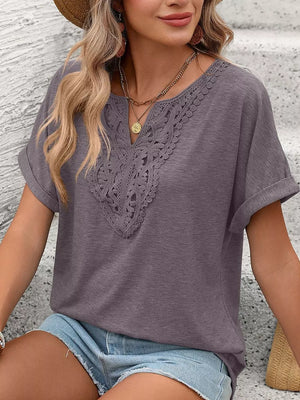 Relaxed fit t-shirt in purple with lace trim neckline and short sleeves.