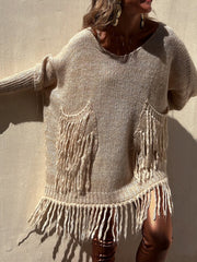 Camel knit poncho sweater with fringe pockets and hem