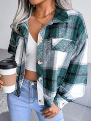 Oversized green tartan shacket with patch pockets and button front.