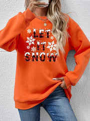 Orange crewneck sweatshirt with "Let It Snow" graphic and snowflakes.