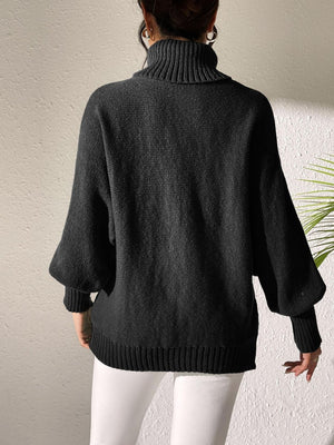Black turtleneck sweater with balloon sleeves and ribbed cuffs and hem