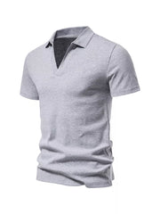 Men's light gray cotton blend polo shirt with notched collar and short sleeves.