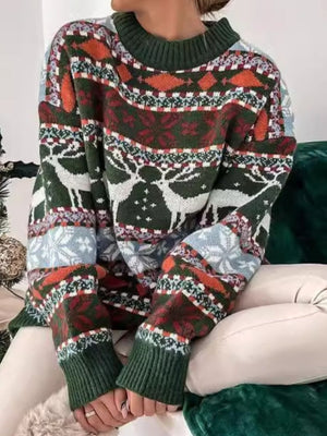 Fair Isle reindeer motif knit sweater in green with crew neck and long sleeves.