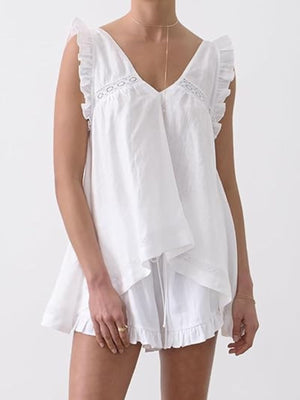 White ruffled V-neck top and shorts set with lace trim and drawstring waist.