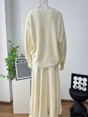 Off white distressed cotton sweater set with deconstructed details and frayed hem