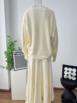 Off white distressed cotton sweater set with deconstructed details and frayed hem
