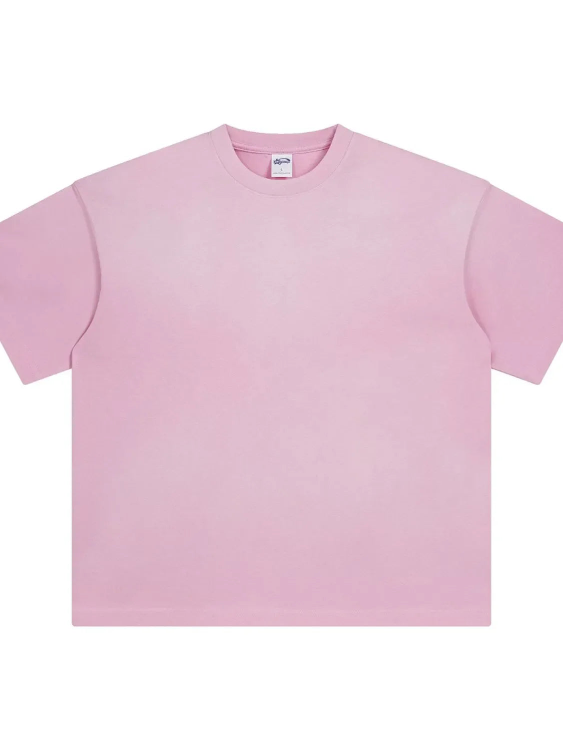 Oversized washed tee in Blush Pink with relaxed fit and crew neck.