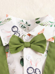 Baby cotton shirt with bunny and carrot print, green bow tie, and suspenders.