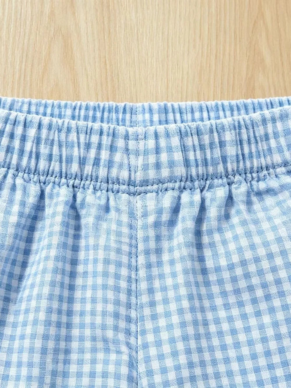 Baby blue gingham shorts with elastic waistband